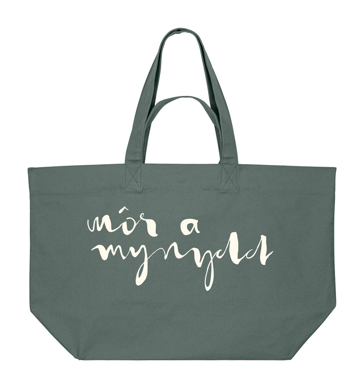 Sage green tote bag with white print MOR A MYNYDD in Welsh